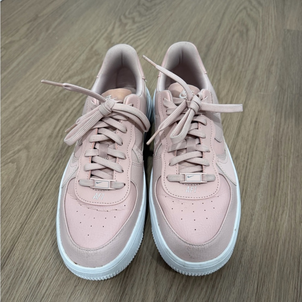 Nike Women's Low-Top Sneakers in Blush Pink and White
